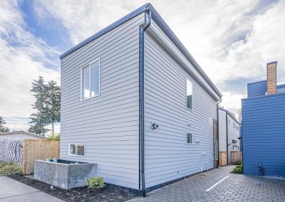 Seattle Backyard Cottage Construction - Exterior Unit B. This DADU features our "Diana DADU" floorpan which is 840 sq. ft. with 2 bedrooms and 2 bathrooms.