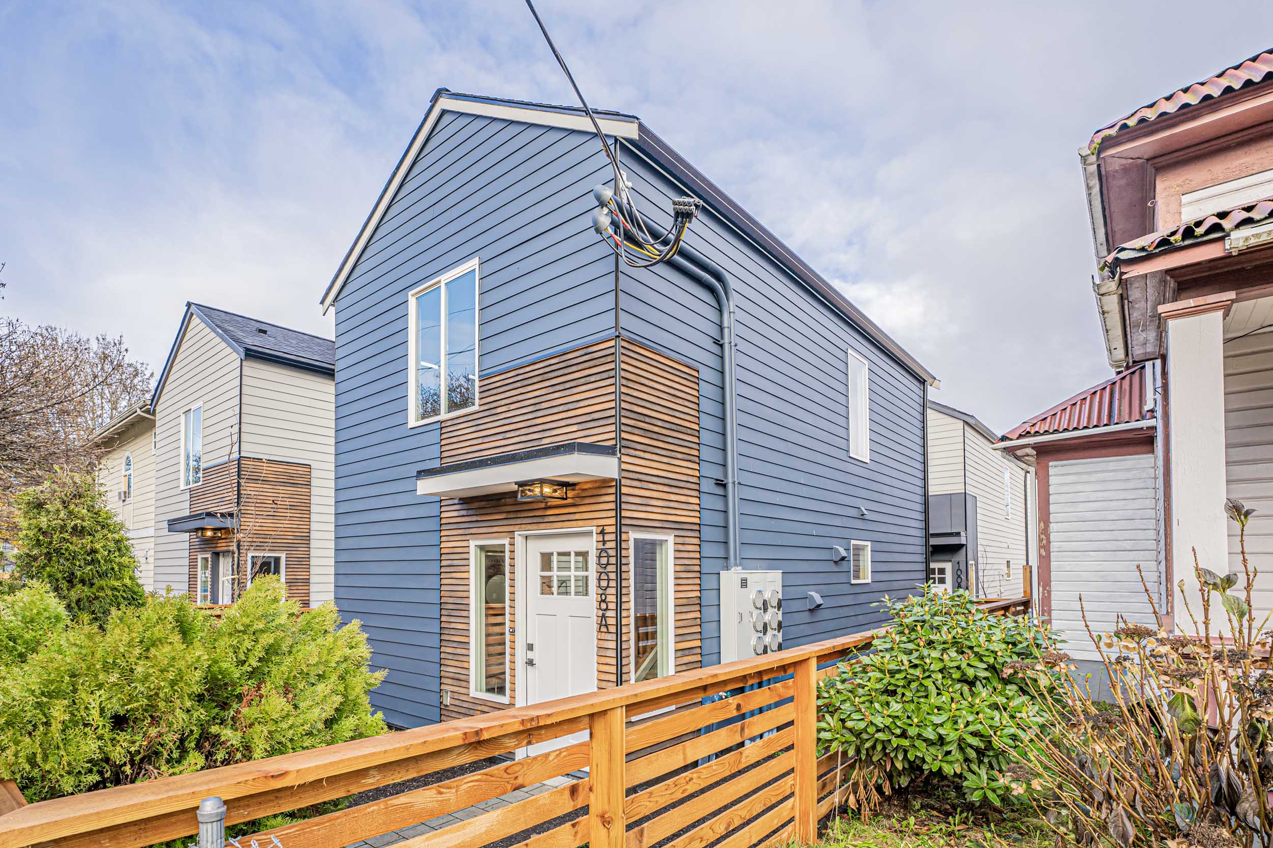 Seattle Backyard Cottage Construction - Exterior Unit A. This DADU features our "Diana DADU" floorpan which is 840 sq. ft. with 2 bedrooms and 2 bathrooms.