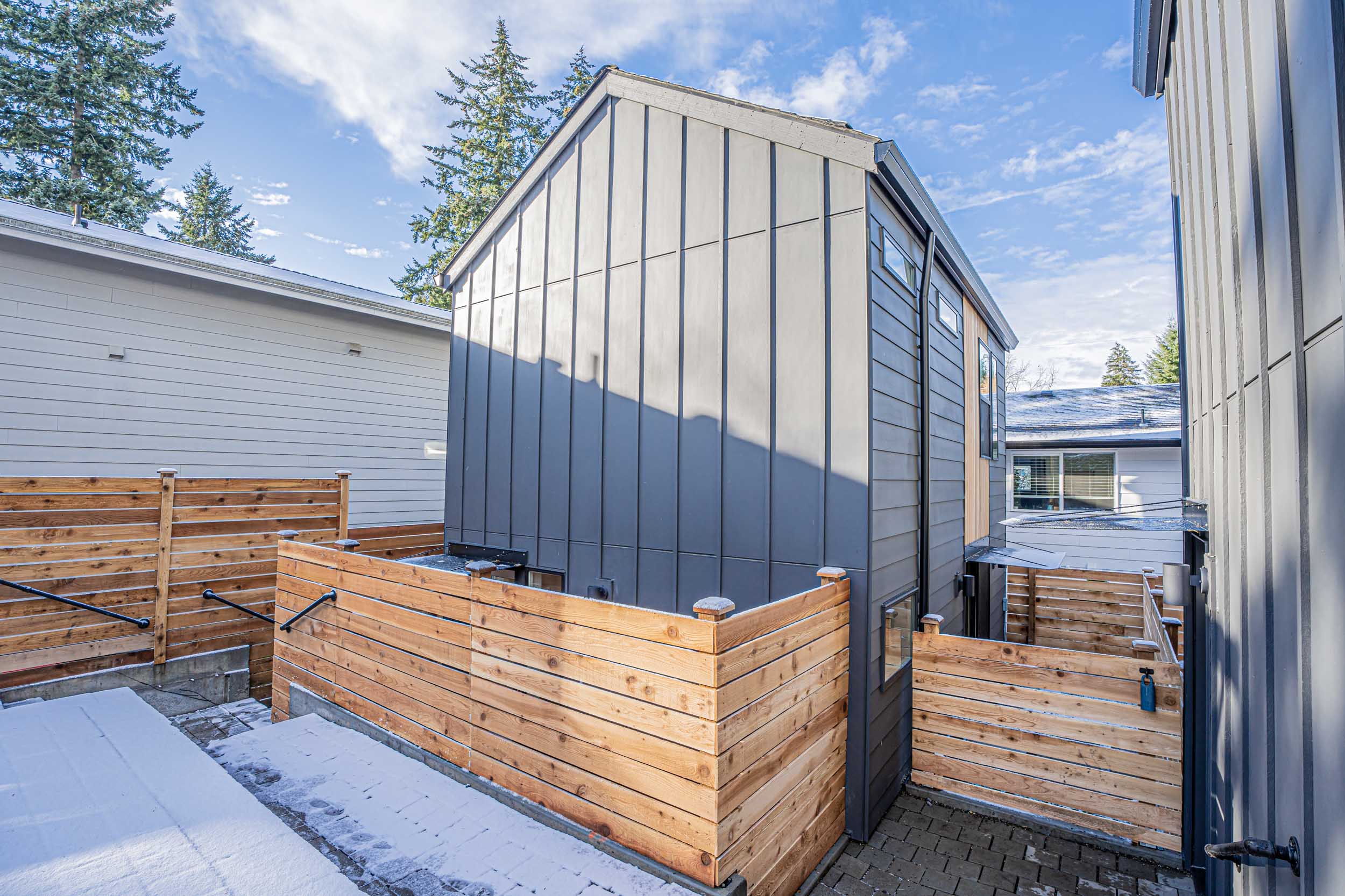 Exterior of a new Seattle DADU construction featuring our Lily DADU floor plan which is 612 sq. ft. with 1 bedroom and 1.5 bathrooms.