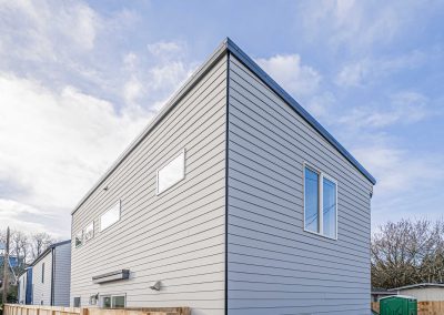 Seattle Backyard Cottage Construction - Exterior Unit B. This DADU features our "Diana DADU" floorpan which is 840 sq. ft. with 2 bedrooms and 2 bathrooms.