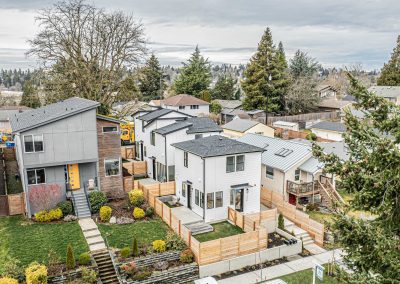 Aerial photos of a brand new SFR & ADU construction located at 8133 18th Ave SW Seattle, WA 98106