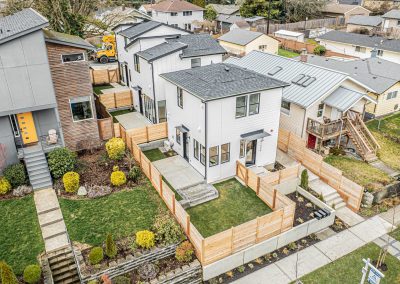 Aerial photos of a brand new SFR & ADU construction located at 8133 18th Ave SW Seattle, WA 98106