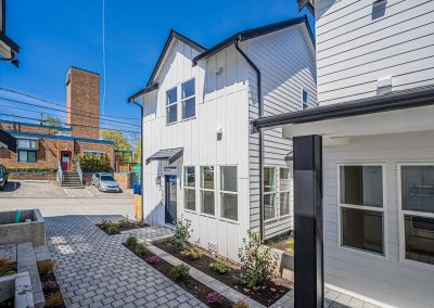 Exterior photos of a brand new ADU (Unit C) construction located at 7555 15th Ave SW Seattle, WA 98106
