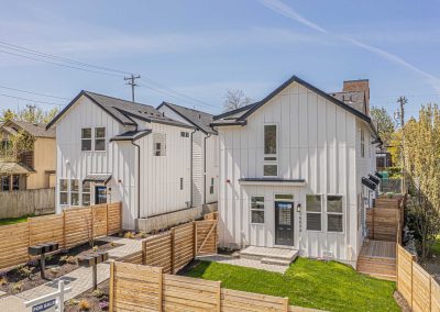 Aerial photos of a brand new SFR & ADU construction located at 7557 15th Ave SW Seattle, WA 98106