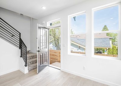 Exterior photos of a brand new ADU (Unit A) construction located at 7555 15th Ave SW Seattle, WA 98106