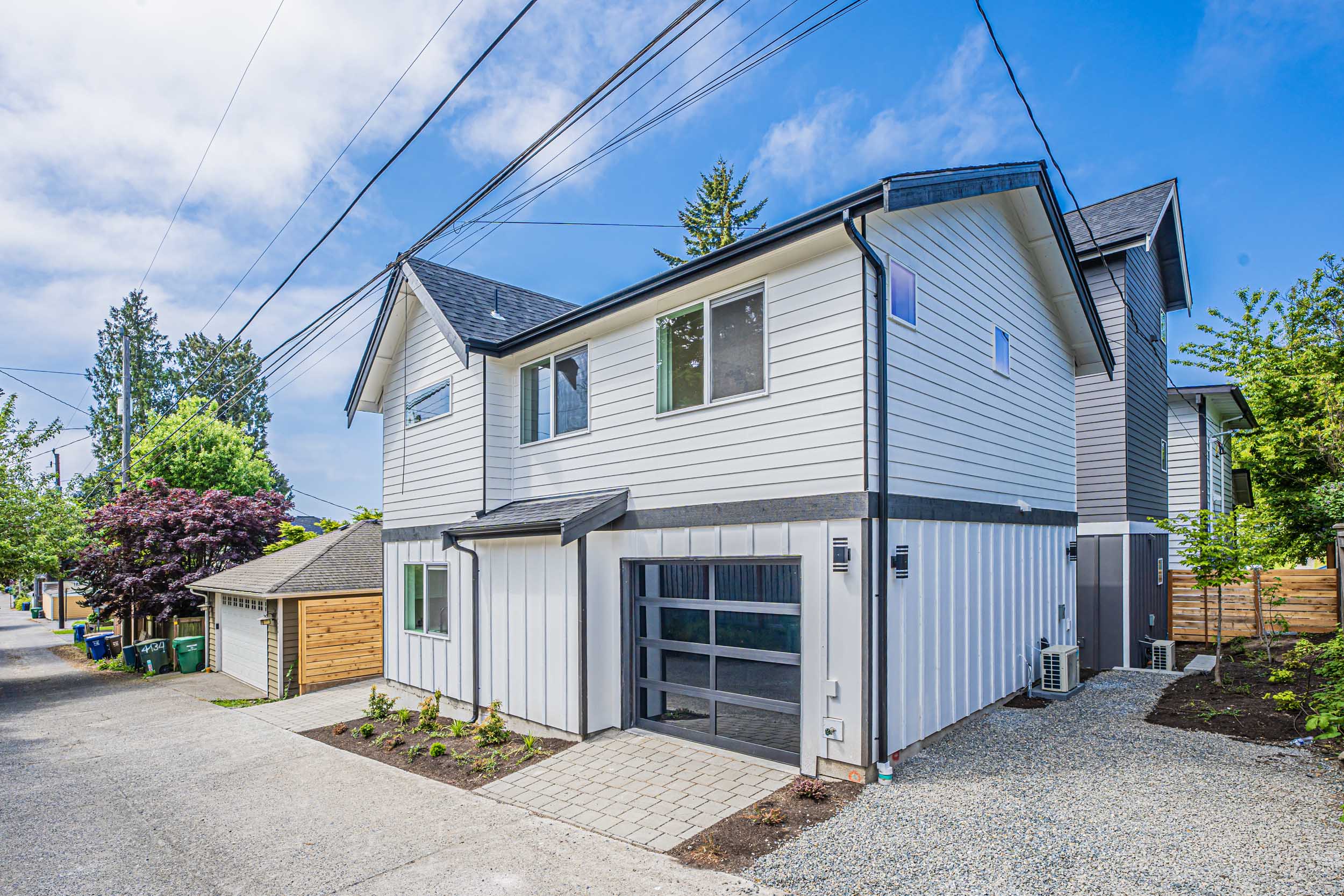 Exterior photos of a brand new DADU construction located at 4432 47th Ave SW, Seattle, WA 98116