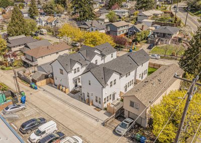 Aerial photos of a brand new SFR & ADU construction located at 7555 15th Ave SW Seattle, WA 98106